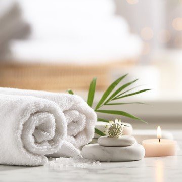 Deep tissue massage session at Ella Luxe Spa with a professional therapist.